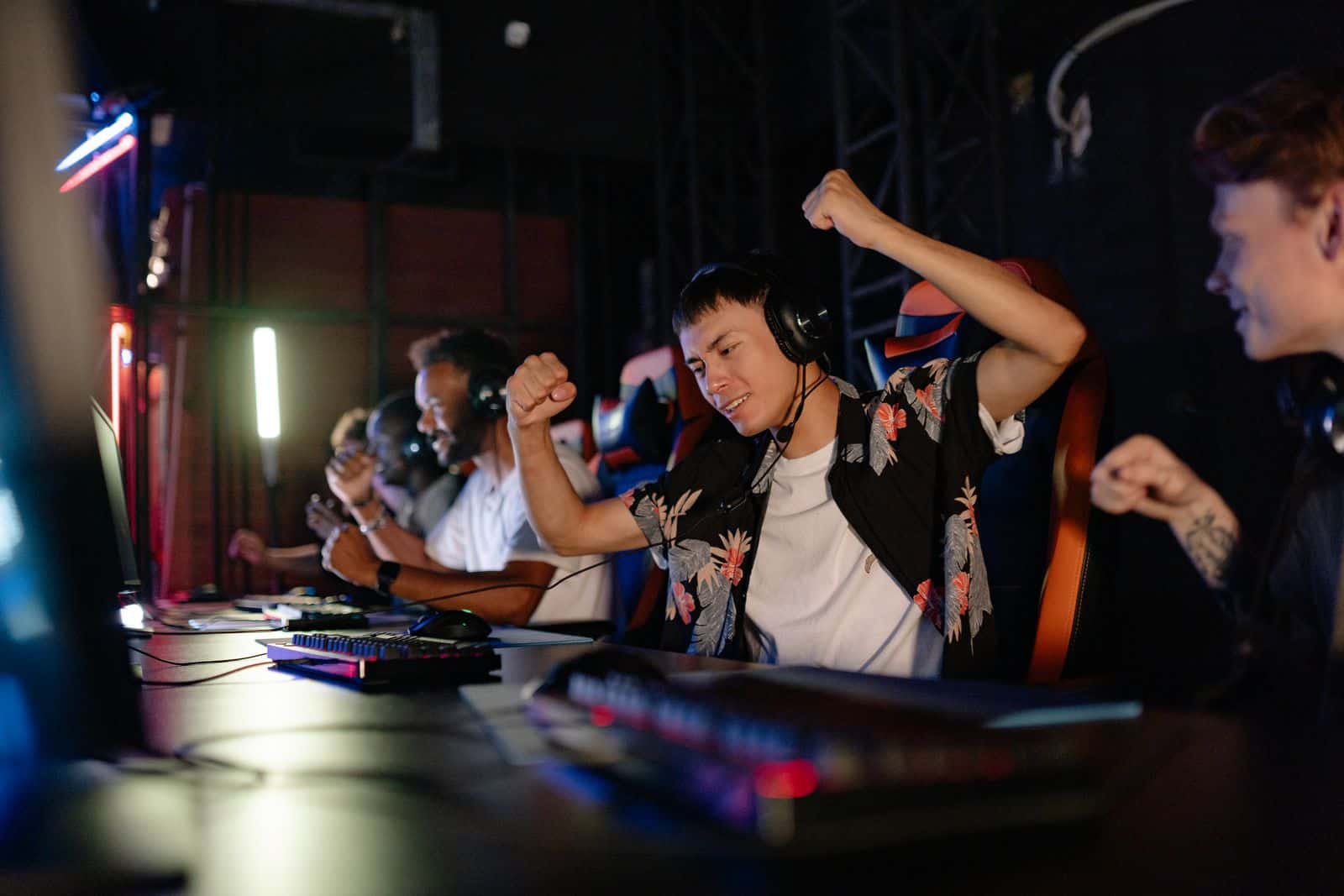 Esports players celebrating a win at a tournament